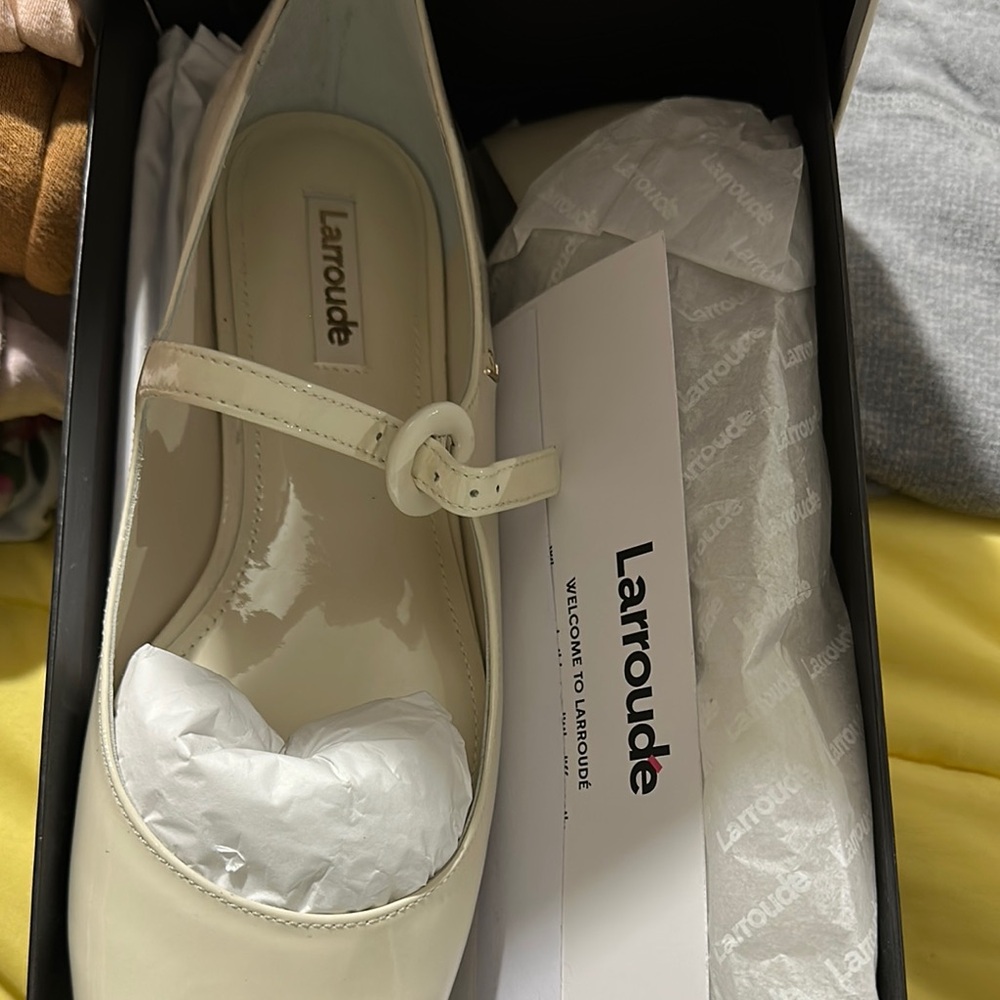 Larroude Cream Flats with Classic Mary Jane Style